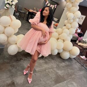 Pink babydoll Vici dress.